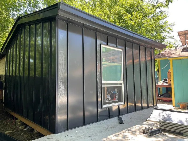 Black standing seam metal wall panels for Roof Inspection in East Troy