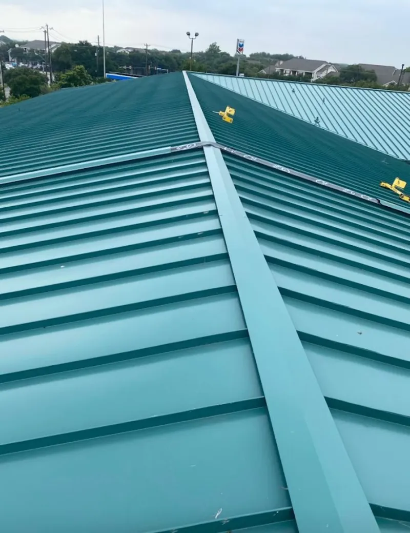 Green commercial metal roof ridge and valley for Metal Roof Repair in East Troy